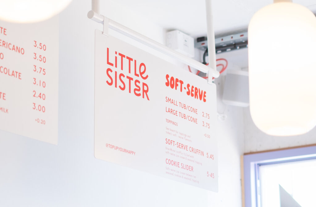 little sister, ice cream and coffee shop designed by Angel & Anchor and the Lost & Found team, Portsteward, Ireland, UK. Interior of store signage